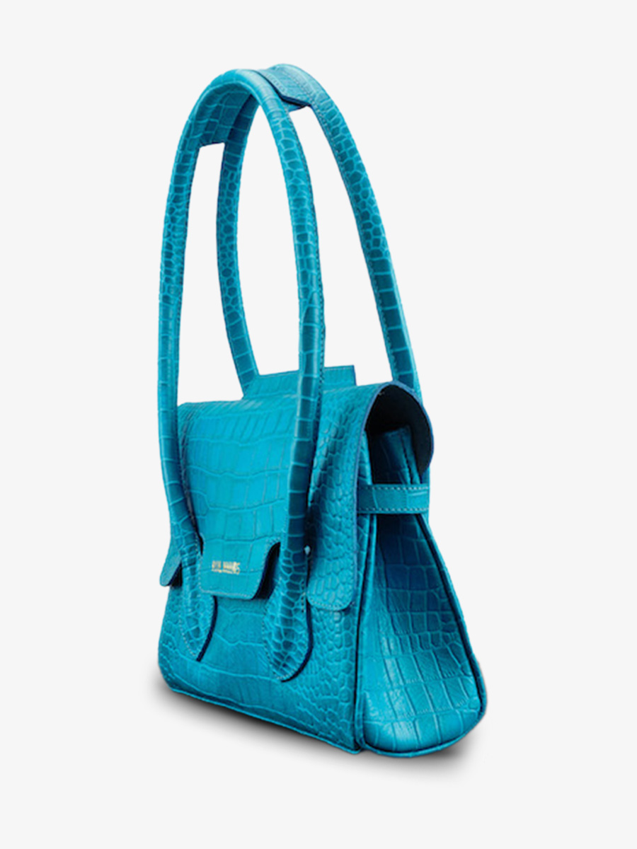 Foto-Seitenansicht-Handtasche-Leder-Damen-blau-Colette-S-Alligator-Cocktail-Topas-Paul-Marius-W28S-A-BLU